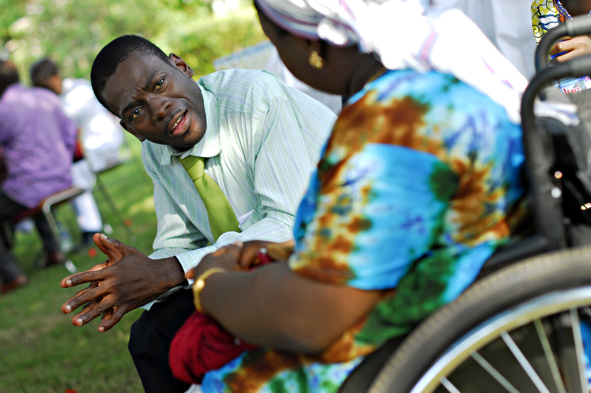 Persons with disabilities in Lomé, Togo rehearse a short sketch as part of a theatrical group. Photo: © CBM/Hayduk